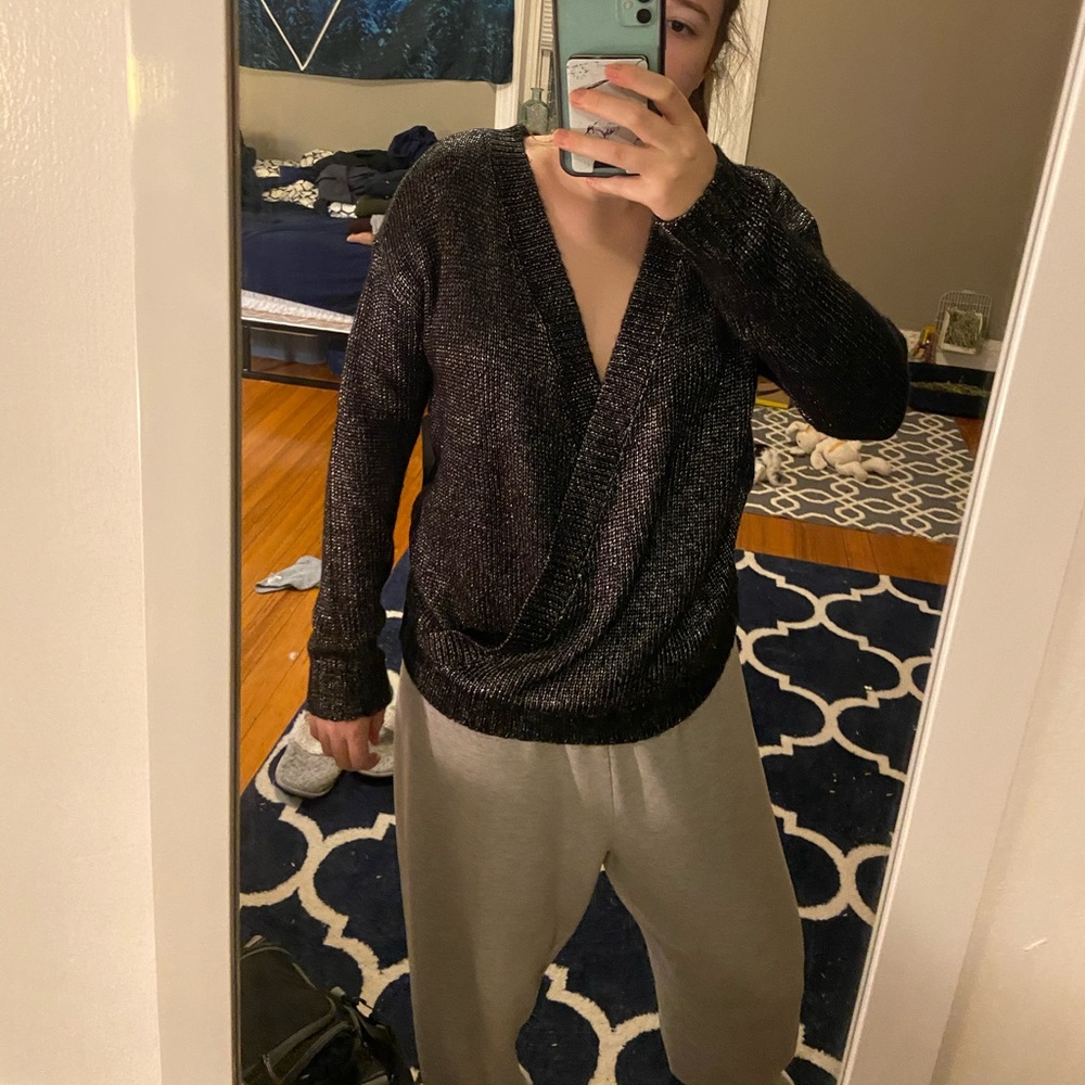 Black and grey cross body sweater